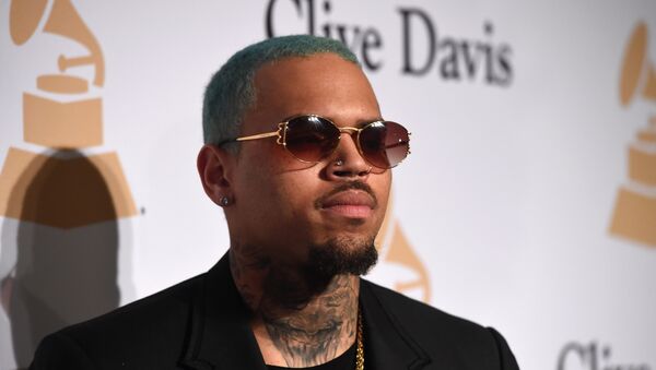 In this file photo taken on February 7, 2015 US rapper Chris Brown attends the Pre-GRAMMY Gala at The Beverly Hilton Hotel in Beverly Hills, California. - Sputnik International