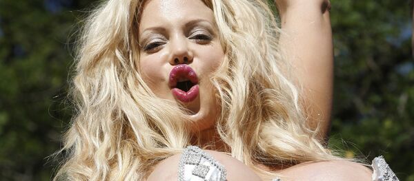 Sabrina Sabrok dances during the annual Gay Pride parade in Madrid, Saturday, July 1, 2006 Sabrina Sabrok dances during the annual Gay Pride parade in Madrid, Saturday, July 1, 2006 - Sputnik International