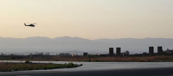 A picture taken during a press tour provided by the Russian Armed Forces on September 12, 2017 shows a Russian Kamov helicopter flies near S-300 missile system at the Hmeimim military base in Latakia province, in the northwest of Syria A picture taken during a press tour provided by the Russian Armed Forces on September 12, 2017 shows a Russian Kamov helicopter flies near S-300 missile system at the Hmeimim military base in Latakia province, in the northwest of Syria - Sputnik International