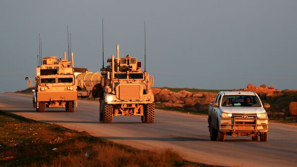 US Marine Corps tactical vehicles are escorted by a Syrian Democratic Forces (SDF) pickup truck along a road near the town of Tal Baydar in the countryside of Syria's northeastern Hasakeh province on December 21, 2018 - Sputnik International