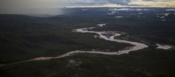 In this Nov. 18, 2015 photo, the Jequitinhonha River snakes across the landscape near Areinha, Minas Gerais state, Brazil. - Sputnik International