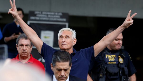 Roger Stone reacts as he walks to microphones after his appearance at Federal Court in Fort Lauderdale, Florida, U.S., January 25, 2019 - Sputnik International