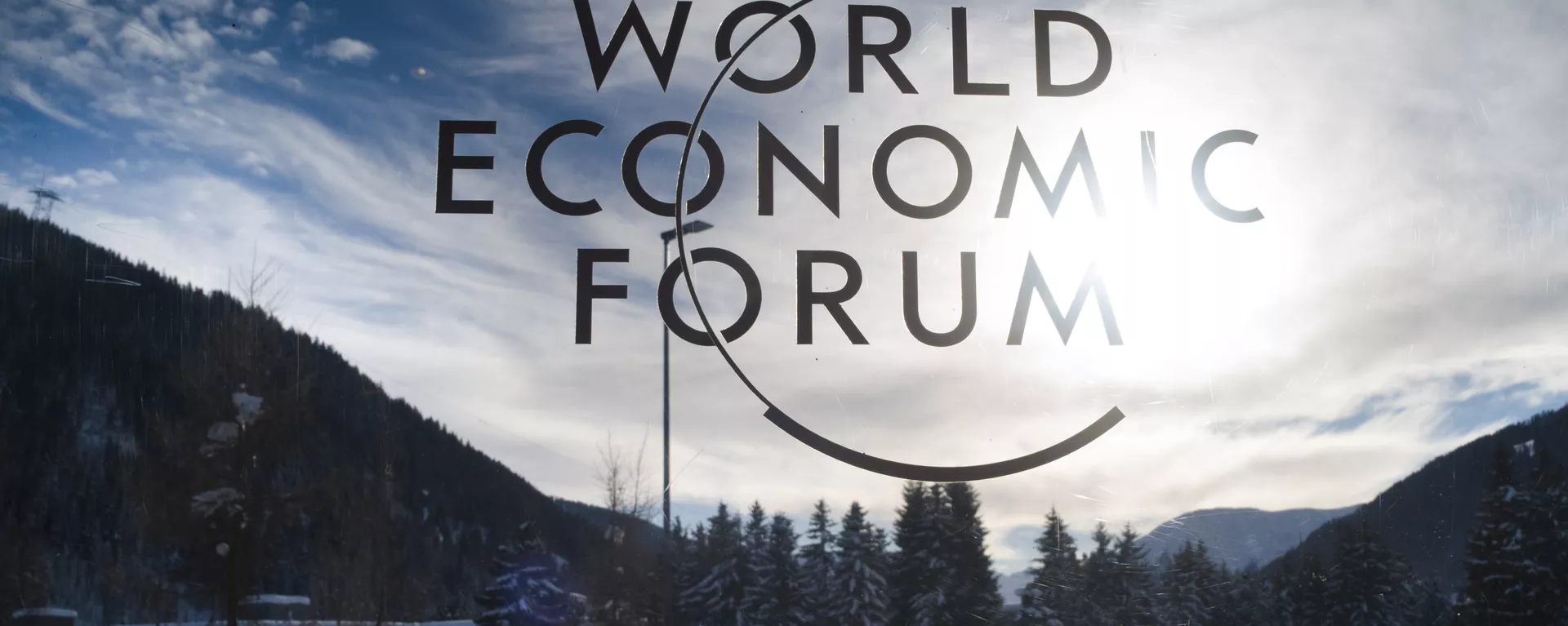 The sign of the World Economic Forum, WEF, is displayed at an entrance door at the congress center at the eve of the meeting in Davos, Sunday, Jan. 20, 2019. - Sputnik International, 1920, 24.01.2025