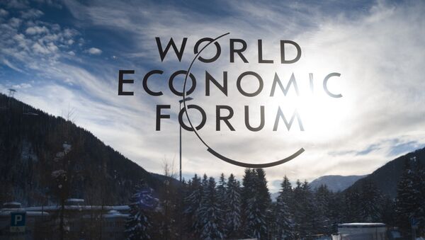 The sign of the World Economic Forum, WEF, is displayed at an entrance door at the congress center at the eve of the meeting in Davos, Sunday, Jan. 20, 2019. - Sputnik International