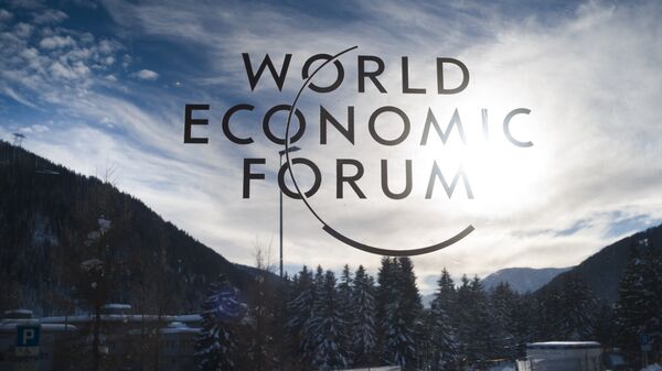 The sign of the World Economic Forum, WEF, is displayed at an entrance door at the congress center at the eve of the meeting in Davos, Sunday, Jan. 20, 2019. - Sputnik International