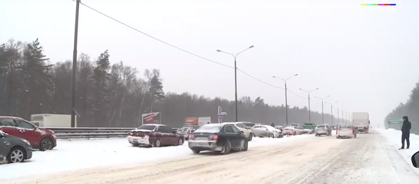 Scene of one of the multi-car pileups outside Moscow. Scene of one of the multi-car pileups outside Moscow. - Sputnik International