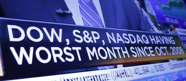 A headline on a television screen on the floor of the New York Stock Exchange - Sputnik International
