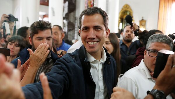 Venezuelan opposition leader and self-proclaimed interim president Juan Guaido arrives to attend a holy mass in Caracas, Venezuela, January 27, 2019 - Sputnik International