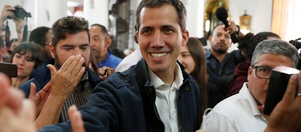 Venezuelan opposition leader and self-proclaimed interim president Juan Guaido arrives to attend a holy mass in Caracas, Venezuela, January 27, 2019 Venezuelan opposition leader and self-proclaimed interim president Juan Guaido arrives to attend a holy mass in Caracas, Venezuela, January 27, 2019 - Sputnik International