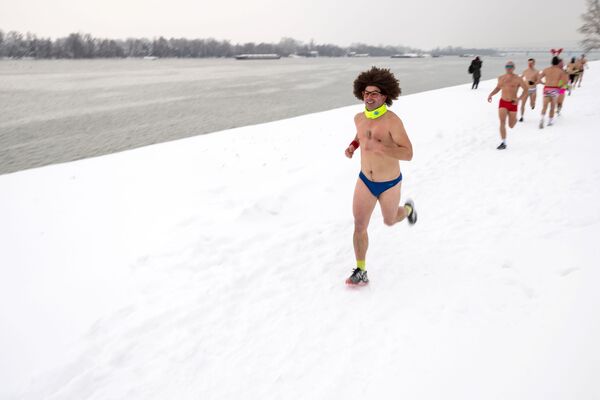 Near-naked runners take on freezing winds in Serbia's Underwear Race