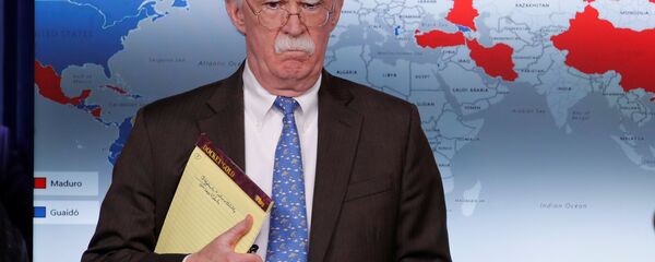 U.S. National Security Adviser John Bolton arrives to address reporters as the Trump administration announces economic sanctions against Venezuela and the Venezuelan state owned oil company Petroleos de Venezuela (PdVSA) during a press briefing at the White House in Washington, U.S., January 28, 2019 U.S. National Security Adviser John Bolton arrives to address reporters as the Trump administration announces economic sanctions against Venezuela and the Venezuelan state owned oil company Petroleos de Venezuela (PdVSA) during a press briefing at the White House in Washington, U.S., January 28, 2019 - Sputnik International