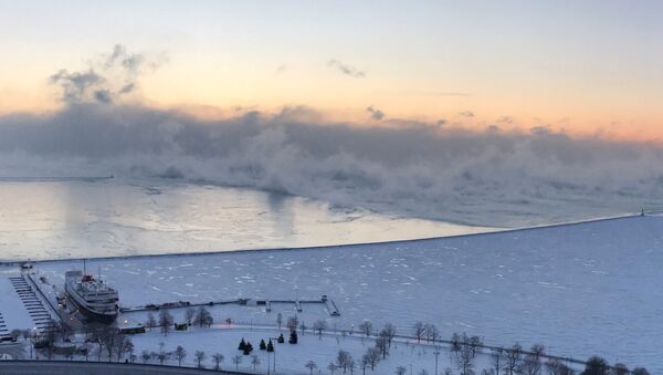 Steam is seen above Lake Michigan during subzero temperatures carried by the polar vortex in Chicago, Illinois, U.S., January 30, 2019, in this picture obtained from social media - Sputnik International
