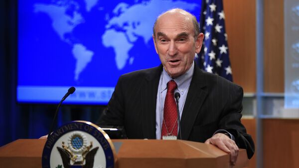 Elliott Abrams talks to reporters after Secretary of State Mike Pompeo named the hawkish former Republican official to handle U.S. policy toward Venezuela during a news conference at the State Department in Washington, Friday, Jan. 25, 2019 - Sputnik International
