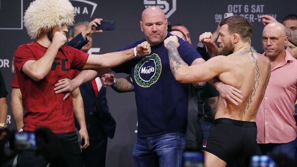 Conor McGregor, right, and Khabib Nurmagomedov face off during a ceremonial weigh-in - Sputnik International