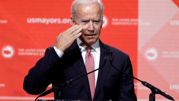 Former U.S. Vice President Joe Biden salutes to the audience at the United States Conference of Mayors winter meeting in Washington, U.S., January 24, 2019 - Sputnik International
