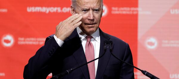 Former U.S. Vice President Joe Biden salutes to the audience at the United States Conference of Mayors winter meeting in Washington, U.S., January 24, 2019 - Sputnik International