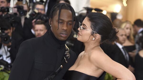 Kylie Jenner, right, and Travis Scott attends The Metropolitan Museum of Art's Costume Institute benefit gala celebrating the opening of the Heavenly Bodies: Fashion and the Catholic Imagination exhibition on Monday, May 7, 2018, in New York - Sputnik International