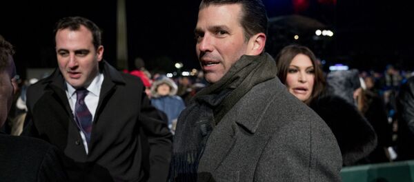 Donald Trump Jr., center, and Kimberly Guilfoyle, right, depart following the National Christmas Tree lighting ceremony at the Ellipse near the White House in Washington. File photo Donald Trump Jr., center, and Kimberly Guilfoyle, right, depart following the National Christmas Tree lighting ceremony at the Ellipse near the White House in Washington. File photo - Sputnik International