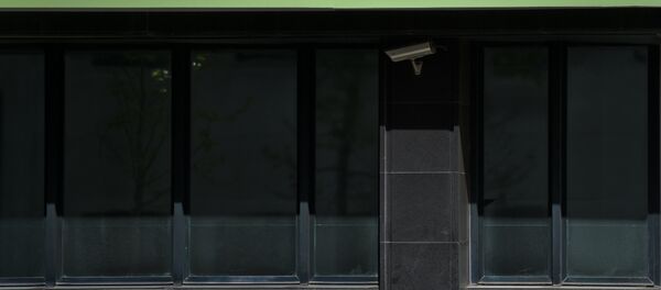 A man stands under a logo of Novo Banco Portuguese bank in Lisbon on March 31, 2017. - Sputnik International