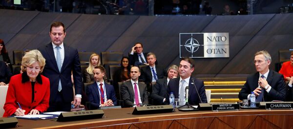 US Ambassador to NATO Kay Bailey Hutchison, Macedonian Foreign Minister Nikola Dimitrov and NATO Secretary General Jens Stoltenberg attend a signature ceremony of the accession protocol between the Republic of North Macedonia and NATO at the Alliance headquarters in Brussels, Belgium February 6, 2019. - Sputnik International