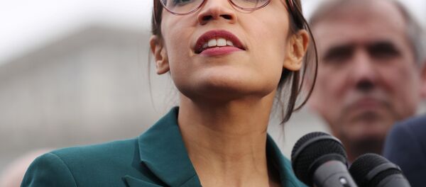 U.S. Representative Alexandria Ocasio-Cortez (D-NY) speaks during a news conference for a proposed Green New Deal to achieve net-zero greenhouse gas emissions in 10 years, at the U.S. Capitol in Washington, U.S. February 7, 2019 U.S. Representative Alexandria Ocasio-Cortez (D-NY) speaks during a news conference for a proposed Green New Deal to achieve net-zero greenhouse gas emissions in 10 years, at the U.S. Capitol in Washington, U.S. February 7, 2019 - Sputnik International