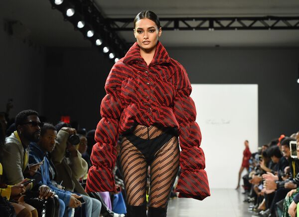 Oh là là! Models walk the runway in racy pieces for luxury