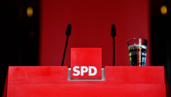 The pulpit is empty after the leader of Germany's social democratic SPD party (unseen) gave a statement in reaction to the results of the state elections in Hesse (Hessen) at the SPD headquarters in Berlin, on October 28, 2018.  Tobias SCHWARZ / AFP - Sputnik International