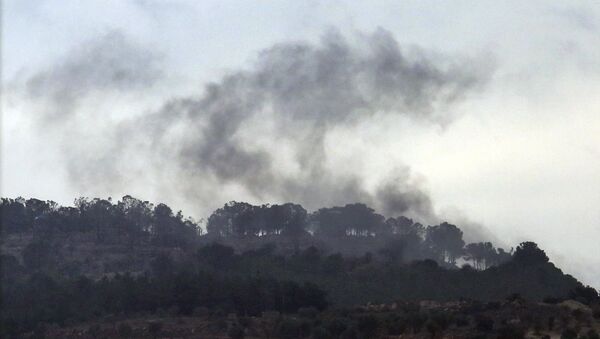 Smoke rises from inside Syria during shelling from Turkish forces, as seen from the Oncupinar border crossing with Syria, known as Bab al Salameh in Arabic, in the outskirts of the town of Kilis, Turkey, Friday, Jan. 26, 2018 - Sputnik International