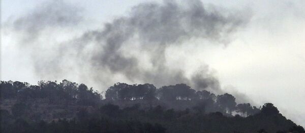 Smoke rises from inside Syria during shelling from Turkish forces, as seen from the Oncupinar border crossing with Syria, known as Bab al Salameh in Arabic, in the outskirts of the town of Kilis, Turkey, Friday, Jan. 26, 2018 - Sputnik International