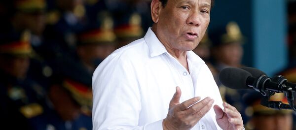 FILE - In this Aug. 8, 2018, file photo, Philippines president Rodrigo Duterte gestures while addressing police force to mark the 117th Philippine National Police Service anniversary at Camp Crame in Quezon city northeast of Manila FILE - In this Aug. 8, 2018, file photo, Philippines president Rodrigo Duterte gestures while addressing police force to mark the 117th Philippine National Police Service anniversary at Camp Crame in Quezon city northeast of Manila - Sputnik International