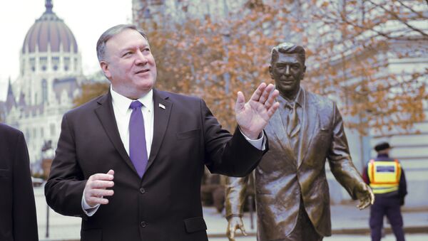 US Secretary of State, Mike Pompeo, is pictured next to a scuplture of former US President Ronald Reagan at the Liberty square (Szabadsag) in Budapest, Hungary, Feb. 11, 2019 - Sputnik International