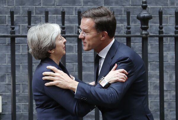 Britain's Prime Minister Theresa May meets Netherlands Prime Minister Mark Rutte for a bilateral talks at 10 Downing Street in London, Wednesday, Feb. 21, 2018.  - Sputnik International