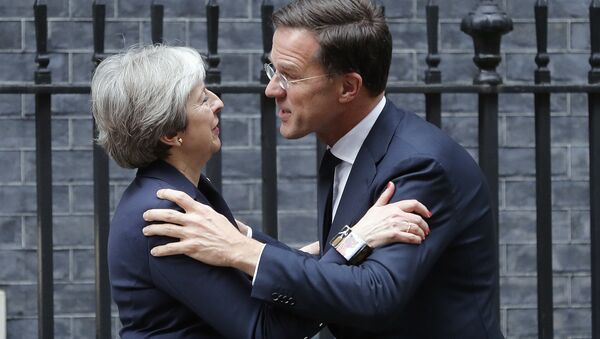 Britain's Prime Minister Theresa May meets Netherlands Prime Minister Mark Rutte for a bilateral talks at 10 Downing Street in London, Wednesday, Feb. 21, 2018. - Sputnik International