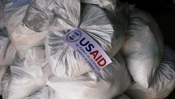 Sacks containing humanitarian aid are pictured at a warehouse near the Tienditas cross-border bridge between Colombia and Venezuela - Sputnik International