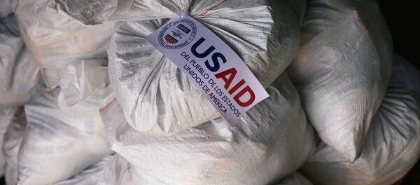 Sacks containing humanitarian aid are pictured at a warehouse near the Tienditas cross-border bridge between Colombia and Venezuela - Sputnik International