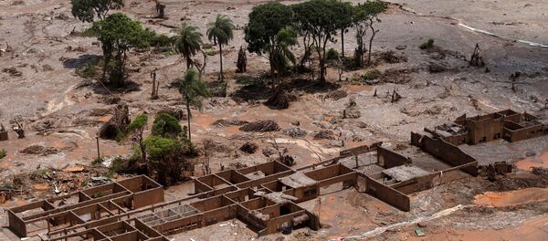 The debris of the municipal school of Bento Rodrigues district, which was covered with mud after a dam owned by Vale SA and BHP Billiton Ltd burst, is pictured in Mariana - Sputnik International
