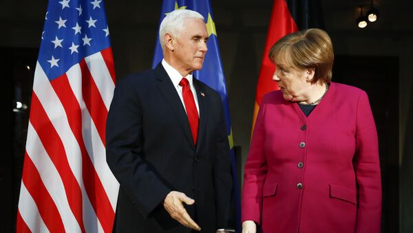 German Chancellor Angela Merkel, right, welcomes United States Vice President Mike Pence, left, for a bilateral meeting during the Munich Security Conference in Munich, Germany, Saturday, Feb. 16, 2019 - Sputnik International