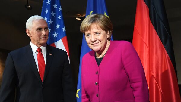 German Chancellor Angela Merkel (R) and US Vice President Mike Pence pose during a photo call at the 55th Munich Security Conference in Munich, southern Germany, on February 16, 2019 - Sputnik International
