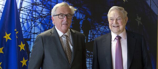 EU commission President Jean-Claude Juncker, left, welcomes George Soros, Founder and Chairman of the Open Society Foundation, prior to a meeting at EU headquarters in Brussels on Thursday, April 27, 2017 - Sputnik International