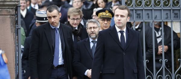 French President Emmanuel Macron, right, with France's Chief Rabbi Haim Korsia, center, leave the Jewish cemetery where tombs were tagged with swastikas in Quatzenheim, eastern France, Tuesday, Feb.19, 2019. French President Emmanuel Macron, right, with France's Chief Rabbi Haim Korsia, center, leave the Jewish cemetery where tombs were tagged with swastikas in Quatzenheim, eastern France, Tuesday, Feb.19, 2019. - Sputnik International