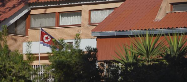 The flag of North Korea waves inside the compound of the North Korean embassy in Rome. File photo - Sputnik International
