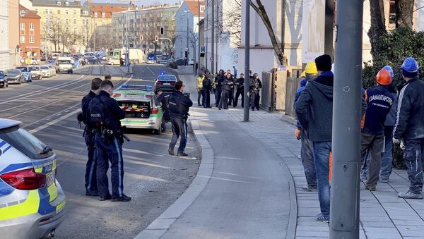Police officers observe a crime scene in Munich, Germany, Thursday, Feb. 21, 2019 - Sputnik International