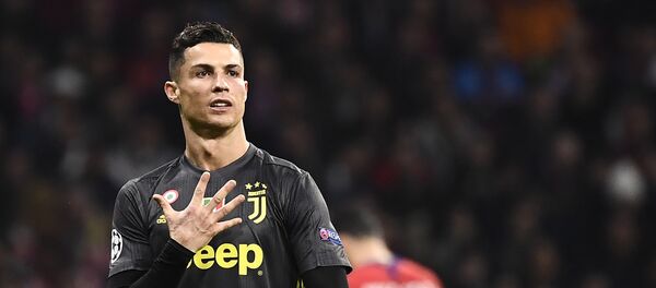 Juventus' Portuguese forward Cristiano Ronaldo gestures during the UEFA Champions League round of 16 first leg football match between Club Atletico de Madrid and Juventus FC at the Wanda Metropolitan stadium in Madrid on February 20, 2019 - Sputnik International