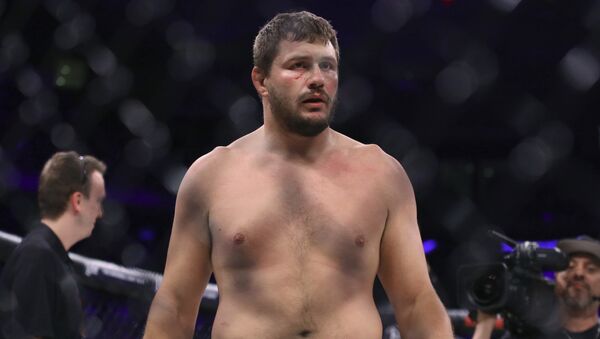 Matt Mitrione stands in the cage after a win against Fedor Emelianenko in a mixed martial arts bout at Bellator 180 on Saturday, June 24, 2017, in New York - Sputnik International