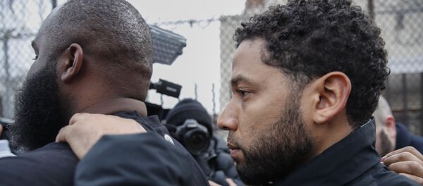 Empire actor Jussie Smollett leaves Cook County jail following his release, Thursday, Feb. 21, 2019, in Chicago. Smollett was charged with disorderly conduct and filling a false police report when he said he was attacked in downtown Chicago by two men who hurled racist and anti-gay slurs and looped a rope around his neck, a police official said Empire actor Jussie Smollett leaves Cook County jail following his release, Thursday, Feb. 21, 2019, in Chicago. Smollett was charged with disorderly conduct and filling a false police report when he said he was attacked in downtown Chicago by two men who hurled racist and anti-gay slurs and looped a rope around his neck, a police official said - Sputnik International