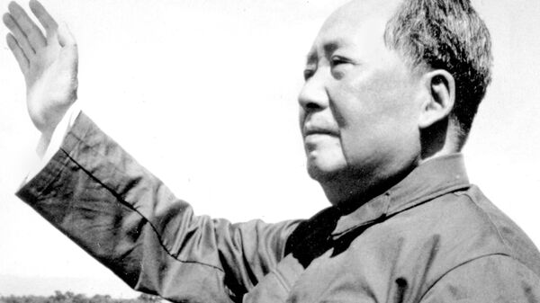 FILE - In this file photo taken in 1966, Mao Zedong waves at the beginning of China's Cultural Revolution. On May 16, 1966, the Communist Party's Politburo produced a document announcing the start of what was formally known as the Great Proletarian Cultural Revolution to pursue class warfare and enlist the population in mass political movements. - Sputnik International