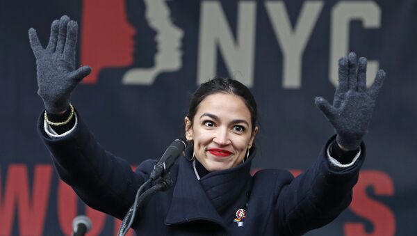 FILE - In this Jan. 19, 2019, file photo, U.S. Rep. Alexandria Ocasio-Cortez, (D-New York) waves to the crowd after speaking at Women's Unity Rally in Lower Manhattan in New York. - Sputnik International