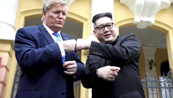 U.S. President Donald Trump impersonator Russell White, left, and Kim Jong-un impersonator Howard X pose for photos outside the Opera House in Hanoi, Vietnam, Friday, Feb. 22, 2019. The second summit between Trump and Kim will take place in Hanoi on Feb. 27 and 28. - Sputnik International
