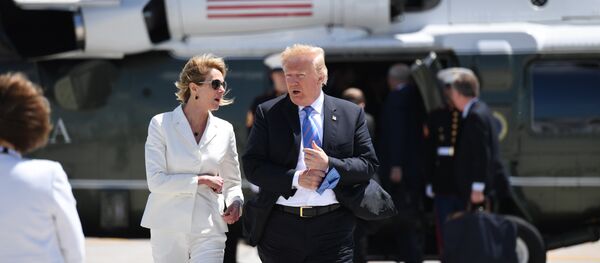 US President Donald Trump, with USAmbassador to Canada Kelly Knight Craft, walks to Air Force One prior to departure from Canadian Forces Base Bagotville in Canada, June 9, 2018. US President Donald Trump, with USAmbassador to Canada Kelly Knight Craft, walks to Air Force One prior to departure from Canadian Forces Base Bagotville in Canada, June 9, 2018. - Sputnik International