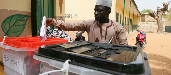 A man casts his vote during Nigeria's presidential election at a polling station in Kazaure, Jigawa State, Nigeria, February 23, 2019. A man casts his vote during Nigeria's presidential election at a polling station in Kazaure, Jigawa State, Nigeria, February 23, 2019. - Sputnik International